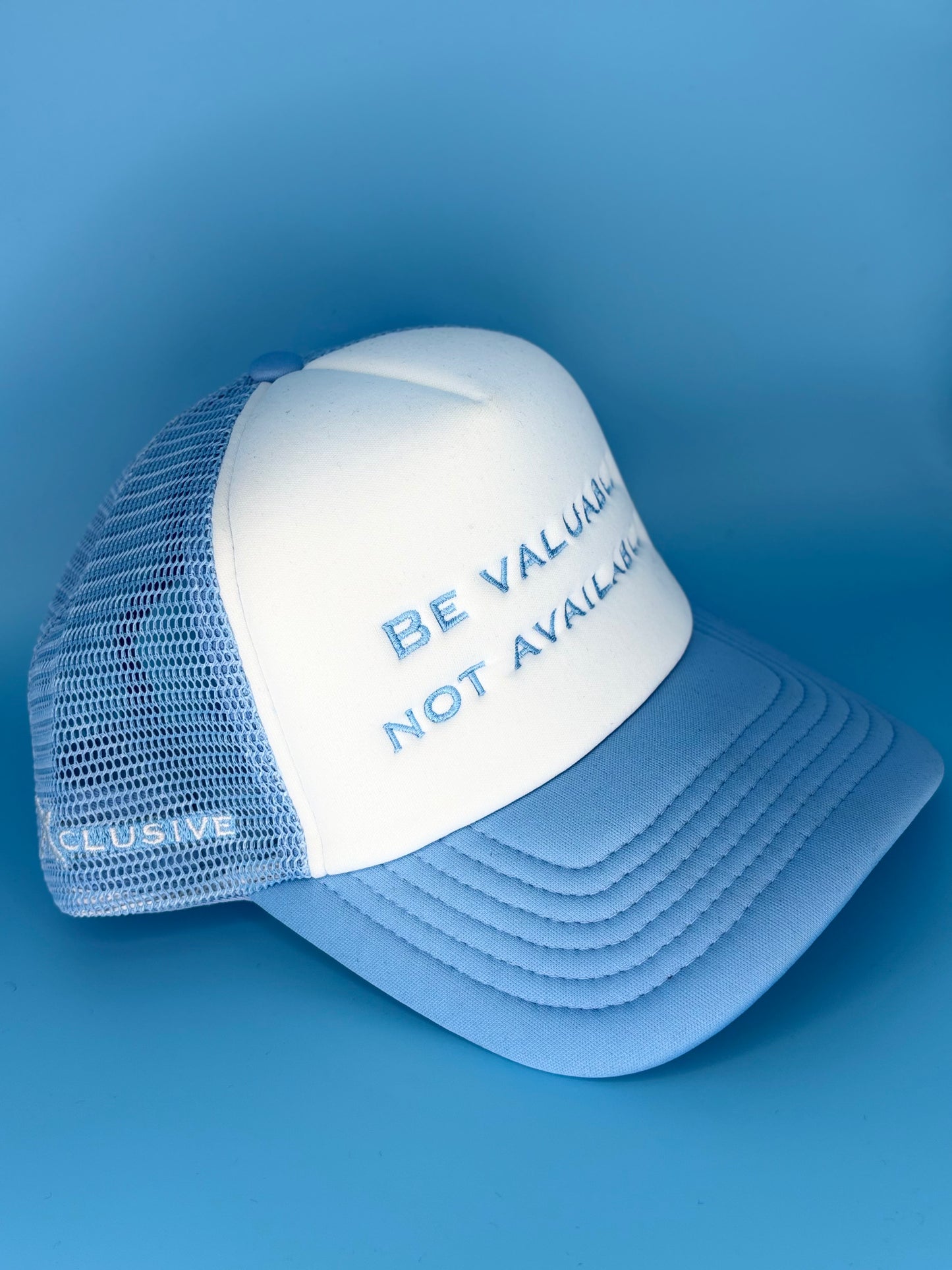 Baby blue “Be Valuable Not Available” Cap